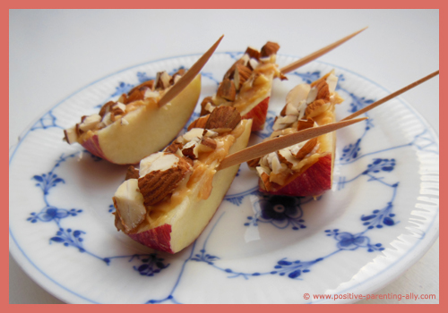 Simple snack recipes for kids: Almond apple boats with peanut butter. 