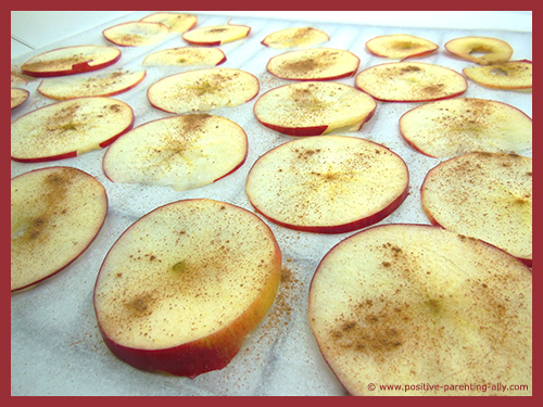 Apple slices with cinnamon ready to go in the oven. 