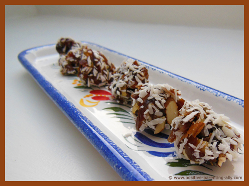 Quick healthy kids snacks: dates with almond and coconut.