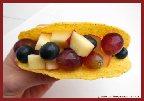 Funky fruit tortilla for kids as a healthy quick snack.