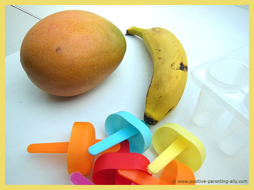 Ingredients for delicious mango banana pure fruit popsicles for kids.