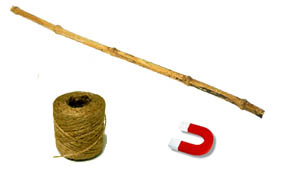 Fun indoor toddler activities. Building a fishing rod with a stick, string and a magnet.