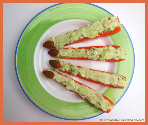 Healthy Halloween finger foods: Green witches' fingers. A really healthy Halloween kids' snack.