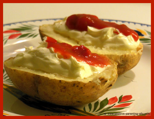 Baked potato with salsa and sour cream" 