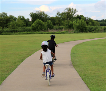 Biking with kids in nature as a healty kids activity.