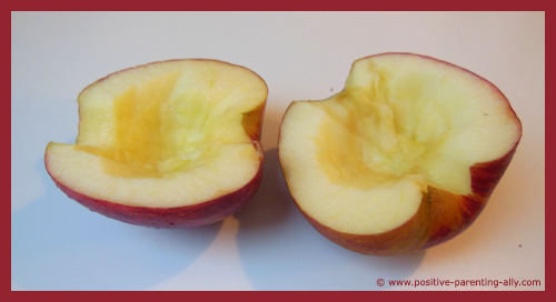 Using a knife to core an apple.