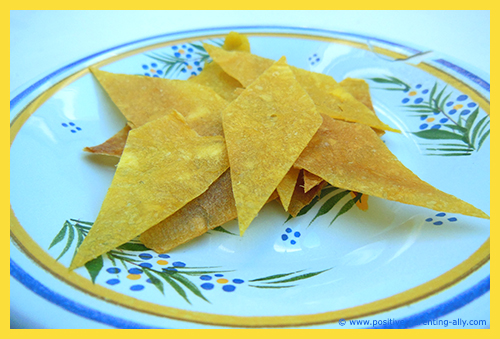 Dried / baked mango cut into squares. A healthy fruit snack for kids. 