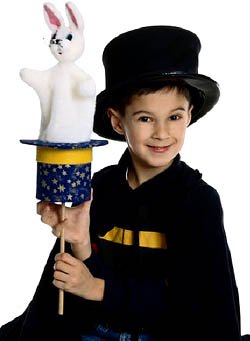 Learning magic tricks for kids: Picture of little boy magician.