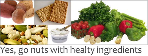 Healthy snack ingredients for kids - nuts, seeds, vegetables, crispbread and cream cheese.