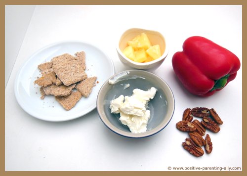 Ingredients for whole grain cracker dip: Cream cheese, pecan nuts, bell pepper, pineapple.