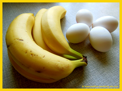 Eggs and bananas as ingredients for banana pancakes. 