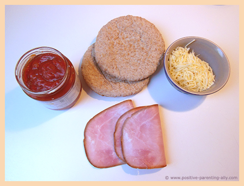 Ingredients for making healthy pizza snack from pita bread.