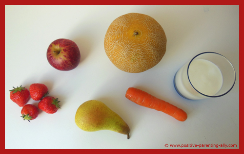 Ingredients for a healthy fruit smoothie with plain yogurt.