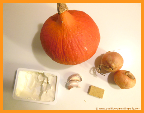 Ingredients for pumpkin soup: pumpkin, onions, garlic, bouillon, lemon.