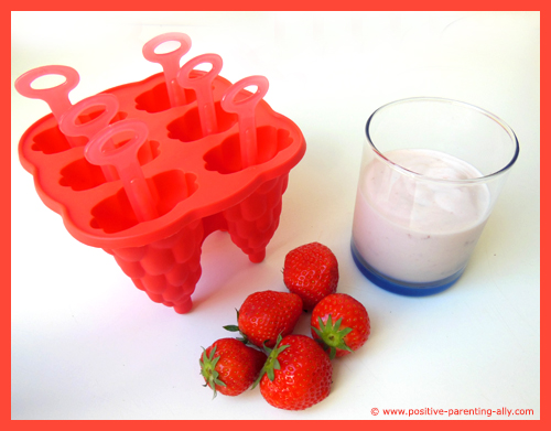 Ingredients for homemade yogurt strawberry icecream with real strawberry pieces.