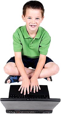 Learning games for kids online: Picture of a little boy with a laptop