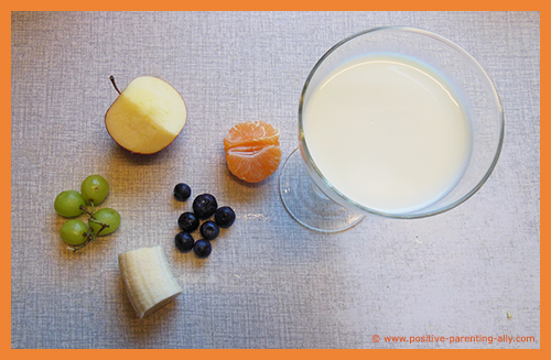 Ingredients for a simple milk and fruit snack for kids.