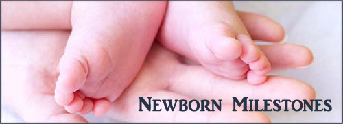 Mother's hand holding her infant's feet. Article on newborn development.
