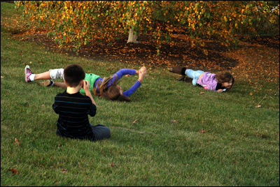 Rolling in the grass playing dog.