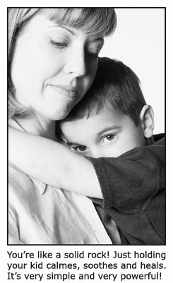 10 parenting tips. Use the power of you body in you parenting. Picture of a mother holding her young boy in her arms comforting him. 