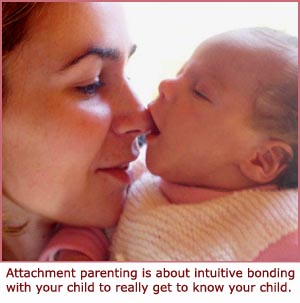 Attachment parenting - cute baby picture - baby sucking on mom's nose