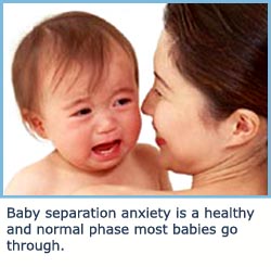 Baby separation anxiety - child crying on shoulder - photo by photorack.net