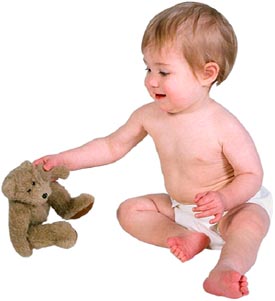 Baby separation anxiety: little baby boy with a teddy bear or a lovey
