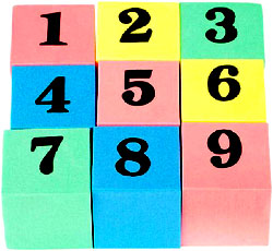 The milestone of counting to 20. Picture of toy blocks with numbers on.