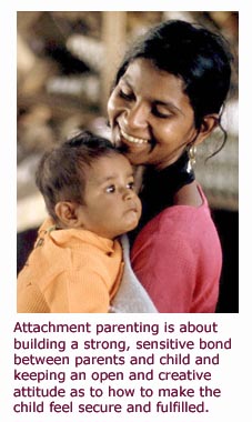 What is attachment parenting - child secure and happy in moms arms