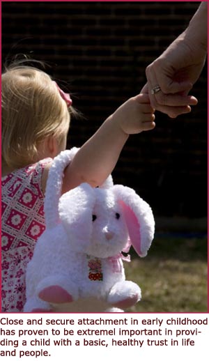 Secure attachment - sweet child photo - girl holding mom's hand