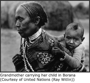 Photo of Ethiopian grandmother carrying baby
