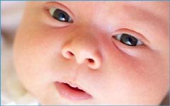 High need baby: picture of baby's face. Looking into baby's eyes.