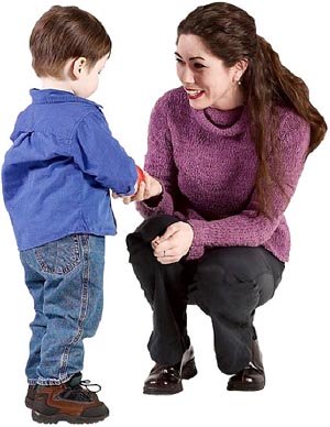 Self esteem activities: mother getting down on her knees to talk to her toddler boy.