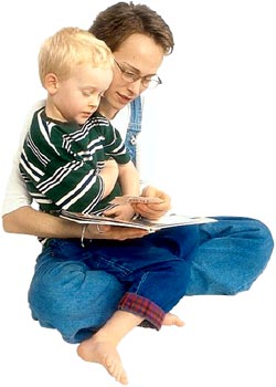 Picture of mom reading out loud with her child. 